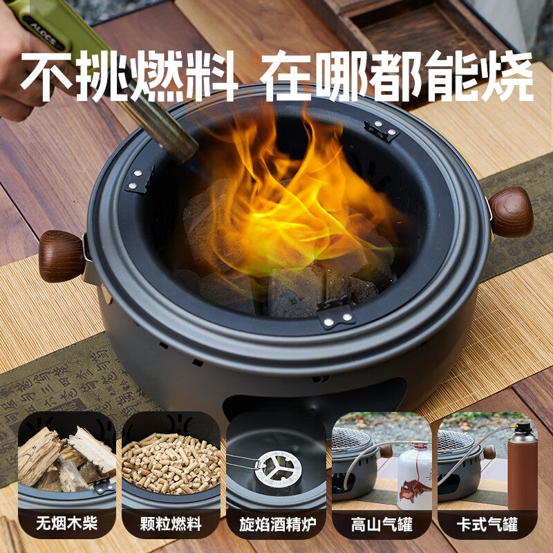 Alocs Panda Master Stove Base CW-C85-B burning wood with flame, multi-fuel compatibility icons shown
